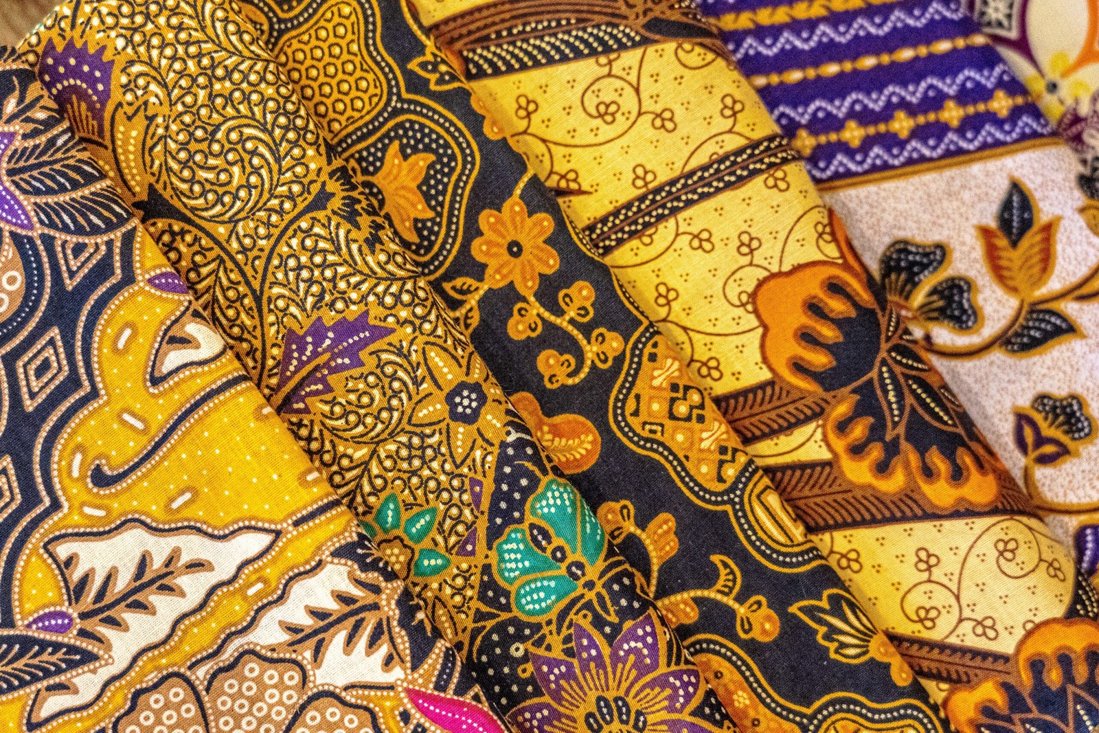 A high angle closeup shot of colorful textiles with beautiful Asian patterns